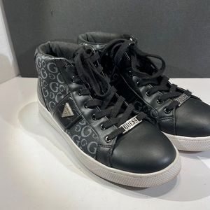 Guess women’s logo high top sneaker size 9.5 M.